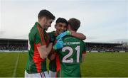 30 April 2016; Mayo's, from left, Eddie Doran, Shairoze Akram and Morgan Lyons celebrate after the game. EirGrid GAA Football Under 21 All-Ireland Championship Final, Cork v Mayo. Cusack Park, Ennis, Co. Clare. Picture credit: Piaras Ó Mídheach / SPORTSFILE
