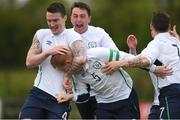 4 May 2016; Christopher Kenny, Republic of Ireland, 5, is congratulated by team-mates and David Delaney and Joseph Dillon after scoring his side's first goal. Defence Forces European Championships Qualifier, Republic of Ireland v France. Mervue Park, Galway. Picture credit: Diarmuid Greene / SPORTSFILE