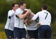 4 May 2016; Christopher Kenny, Republic of Ireland, 5, is congratulated by team-mates and Joseph Dillon, Lee Delaney and Aidan Friel, after scoring his side's first goal. Defence Forces European Championships Qualifier, Republic of Ireland v France. Mervue Park, Galway. Picture credit: Diarmuid Greene / SPORTSFILE