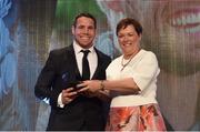 4 May 2016; Leinster's Isaac Boss is presented with the Vodafone Medal of Excellence award by Paula Murphy, Vodafone, at the Zurich IRUPA Rugby Player Awards. Hilton by Double Tree, Ballsbridge, Dublin. Picture credit: Ramsey Cardy / SPORTSFILE