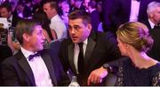 4 May 2016; In attendance at the Zurich IRUPA Rugby Player Awards is Munster and Ireland player CJ Stander, centre, in conversation with former Ireland and Munster fly-half Ronan O'Gara and his wife Jessica. Hilton by Double Tree, Ballsbridge, Dublin. Picture credit: Ramsey Cardy / SPORTSFILE