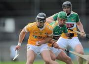 30 May 2010; Cormac Donnelly, Antrim, in action against Joe Bergin and Joe Brady, right, Offaly. Leinster GAA Hurling Senior Championship, Antrim v Offaly, Parnell Park, Dublin. Picture credit: Brian Lawless / SPORTSFILE