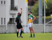 30 May 2010; Derek Molloy, Offaly, is shown the red card by referee Anthony Stapleton. Leinster GAA Hurling Senior Championship, Antrim v Offaly, Parnell Park, Dublin. Picture credit: Brian Lawless / SPORTSFILE