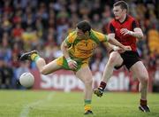 30 May 2010; Kevin Cassidy, Donegal, in action against Kalum King, Down. Ulster GAA Football Senior Championship Quarter-Final, Donegal v Down, Mac Cumhail Park, Ballybofey, Co. Donegal. Picture credit: Oliver McVeigh / SPORTSFILE