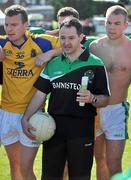 30 May 2010; London manager Noel Dunning speaks to his team after defeat to Roscommon. Connacht GAA Football Senior Championship Quarter-Final, London v Roscommon, Emerald Park, Ruislip, London, England. Picture credit: Diarmuid Greene / SPORTSFILE
