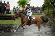 29 May 2010; Ireland's Patricia Ryan on Fernhill Clover Mist goes through the water jump during the Cross Country Discipline of the FEI World Cup Qualifier at the 2010 Tattersalls International Horse Trials, in association with Horse Sport Ireland. Tattersalls, Ratoath, Co. Meath. Picture credit: Brendan Moran / SPORTSFILE