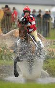 29 May 2010; Great Britain's Georgina Browne on Carnival Carousel goes through the water jump during the One Star International Cross Country Competition at the 2010 Tattersalls International Horse Trials, in association with Horse Sport Ireland. Tattersalls, Ratoath, Co. Meath. Picture credit: Brendan Moran / SPORTSFILE