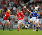 30 May 2010; David Kelly, Ballina National School, Tipperary, in action against Ian Butler, Belgooly, Cork, during the half-time Go Games match. Munster GAA Hurling Senior Championship Quarter-Final, Cork v Tipperary, Pairc Ui Chaoimh, Cork. Picture credit: Ray McManus / SPORTSFILE