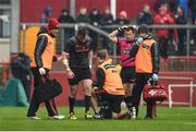 7 May 2016; Niall Scannell, Munster, leaves the pitch for a head injury assessment with Munster doctor Jim Donovan. Guinness PRO12, Round 22, Munster v Scarlets. Thomond Park, Limerick. Picture credit: Diarmuid Greene / SPORTSFILE