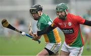 7 May 2016; Michael Ryan, Carlow, in action against Shane Dooley, Offaly. Leinster GAA Hurling Championship Qualifier, Round 2, Offaly v Carlow. O'Connor Park, Tullamore, Co. Offaly. Picture credit: Matt Browne / SPORTSFILE