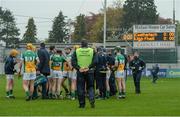 7 May 2016; Offaly manager Eamonn Kelly watches his team huddle before the start of the match against Carlow. Leinster GAA Hurling Championship Qualifier, Round 2, Offaly v Carlow. O'Connor Park, Tullamore, Co. Offaly. Picture credit: Matt Browne / SPORTSFILE