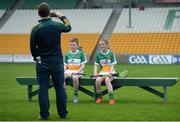 7 May 2016; Offaly mascots 11 year old Cait Hickey, from Banagher, and 10 year old Michael Kearney, from Durrow, have a picture taken by Offaly PRO Kenny Franks before the start of the match. Leinster GAA Hurling Championship Qualifier, Round 2, Offaly v Carlow. O'Connor Park, Tullamore, Co. Offaly. Picture credit: Matt Browne / SPORTSFILE
