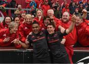 7 May 2016; Munster's Francis Saili and Ian Keatley celebrate with members of the Munster Rugby supporters choir after after the game. Guinness PRO12, Round 22, Munster v Scarlets. Thomond Park, Limerick. Picture credit: Diarmuid Greene / SPORTSFILE