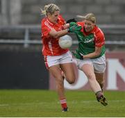 7 May 2016; Cora Staunton, Mayo, in action against Bríd Stack, Cork. Lidl Ladies Football National League, Division 1, Final, Mayo v Cork. Parnell Park, Dublin. Picture credit: Piaras Ó Mídheach / SPORTSFILE