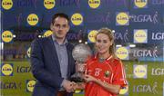 7 May 2016; Orla Finn, Cork, is presented with her player of the match award by John Paul Scally, Managing Director, Lidl. Lidl Ladies Football National League, Division 1, Final, Mayo v Cork. Parnell Park, Dublin. Picture credit: Piaras Ó Mídheach / SPORTSFILE