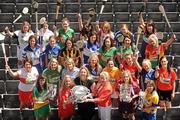 2 June 2010; At the launch of the Gala All-Ireland Camogie Championships 2010 are players from the competing counties with front, from left, Michaela Morkan, Offaly, Joanne O'Callaghan, Cork, Denise Lord, Customer Services Manager, Gala, Joan O'Flynn, President, Cumann Camogaiochta na nGael, Susan Earner, Galway, and Donna Kelly, Roscommon. Camogie fans are set for a triple delight following the announcement at the launch that the Intermediate Camogie Final will be played with the Senior and Premier Junior Finals for the first time in GAA headquarters this year. Croke Park, Dublin. Picture credit: Ray McManus / SPORTSFILE