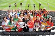 2 June 2010; At the launch of the Gala All-Ireland Camogie Championships 2010 are captains from the competing counties, including front, from left, Claire O'Kane, Derry, Michaela Morkan, Offaly, Joanne O'Callaghan, Cork, Denise Lord, Customer Services Manager, Gala, Susan Earner, Galway, Donna Kelly, Roscommon and Bernie Murray, Armagh. Camogie fans are set for a triple delight following the announcement at the launch that the Intermediate Camogie Final will be played with the Senior and Premier Junior Finals for the first time in GAA headquarters this year. Croke Park, Dublin. Picture credit: Brendan Moran / SPORTSFILE