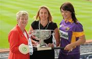 2 June 2010; At the launch of the Gala All-Ireland Camogie Championships 2010, from left, Joan O'Flynn, President, Cumann Camogaiochta na nGael, Denise Lord, Customer Service Manager, Gala, and Una Leacy, Wexford, with the O'Duffy Cup. Camogie fans are set for a triple delight following the announcement at the launch that the Intermediate Camogie Final will be played with the Senior and Premier Junior Finals for the first time in GAA headquarters this year. Croke Park, Dublin. Picture credit: Brendan Moran / SPORTSFILE