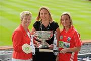 2 June 2010; At the launch of the Gala All-Ireland Camogie Championships 2010, from left, Joan O'Flynn, President, Cumann Camogaiochta na nGael, Denise Lord, Customer Service Manager, Gala, and Joanne O'Callaghan, Cork, with the O'Duffy Cup. Camogie fans are set for a triple delight following the announcement at the launch that the Intermediate Camogie Final will be played with the Senior and Premier Junior Finals for the first time in GAA headquarters this year. Croke Park, Dublin. Picture credit: Brendan Moran / SPORTSFILE