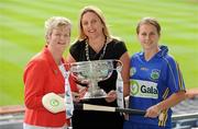 2 June 2010; At the launch of the Gala All-Ireland Camogie Championships 2010, from left, Joan O'Flynn, President, Cumann Camogaiochta na nGael, Denise Lord, Customer Service Manager, Gala, and Jill Horan, Tipperary, with the O'Duffy Cup. Camogie fans are set for a triple delight following the announcement at the launch that the Intermediate Camogie Final will be played with the Senior and Premier Junior Finals for the first time in GAA headquarters this year. Croke Park, Dublin. Picture credit: Brendan Moran / SPORTSFILE
