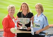 2 June 2010; At the launch of the Gala All-Ireland Camogie Championships 2010, from left, Joan O'Flynn, President, Cumann Camogaiochta na nGael, Denise Lord, Customer Service Manager, Gala, and Catriona Power, Dublin, with the O'Duffy Cup. Camogie fans are set for a triple delight following the announcement at the launch that the Intermediate Camogie Final will be played with the Senior and Premier Junior Finals for the first time in GAA headquarters this year. Croke Park, Dublin. Picture credit: Brendan Moran / SPORTSFILE