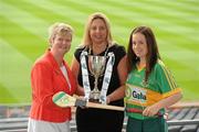 2 June 2010; At the launch of the Gala All-Ireland Camogie Championships 2010, from left, Joan O'Flynn, President, Cumann Camogaiochta na nGael, Denise Lord, Customer Service Manager, Gala, and Louise Donoghue, Meath, with the Premier Junior Cup. Camogie fans are set for a triple delight following the announcement at the launch that the Intermediate Camogie Final will be played with the Senior and Premier Junior Finals for the first time in GAA headquarters this year. Croke Park, Dublin. Picture credit: Brendan Moran / SPORTSFILE