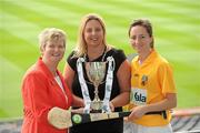 2 June 2010; At the launch of the Gala All-Ireland Camogie Championships 2010, from left, Joan O'Flynn, President, Cumann Camogaiochta na nGael, Denise Lord, Customer Service Manager, Gala, and Jane Adams, Antrim, with the Premier Junior Cup. Camogie fans are set for a triple delight following the announcement at the launch that the Intermediate Camogie Final will be played with the Senior and Premier Junior Finals for the first time in GAA headquarters this year. Croke Park, Dublin. Picture credit: Brendan Moran / SPORTSFILE