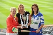 2 June 2010; At the launch of the Gala All-Ireland Camogie Championships 2010, from left, Joan O'Flynn, President, Cumann Camogaiochta na nGael, Denise Lord, Customer Service Manager, Gala, and Mairead Murphy, Waterford, with the Premier Junior Cup. Camogie fans are set for a triple delight following the announcement at the launch that the Intermediate Camogie Final will be played with the Senior and Premier Junior Finals for the first time in GAA headquarters this year. Croke Park, Dublin. Picture credit: Brendan Moran / SPORTSFILE