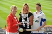 2 June 2010; At the launch of the Gala All-Ireland Camogie Championships 2010, from left, Joan O'Flynn, President, Cumann Camogaiochta na nGael, Denise Lord, Customer Service Manager, Gala, and Eileen McElroy, Monaghan, with the Junior B Cup. Camogie fans are set for a triple delight following the announcement at the launch that the Intermediate Camogie Final will be played with the Senior and Premier Junior Finals for the first time in GAA headquarters this year. Croke Park, Dublin. Picture credit: Brendan Moran / SPORTSFILE