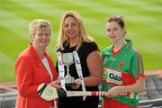 2 June 2010; At the launch of the Gala All-Ireland Camogie Championships 2010, from left, Joan O'Flynn, President, Cumann Camogaiochta na nGael, Denise Lord, Customer Service Manager, Gala, and Miream Cunniffe, Mayo, with the Junior B Cup. Camogie fans are set for a triple delight following the announcement at the launch that the Intermediate Camogie Final will be played with the Senior and Premier Junior Finals for the first time in GAA headquarters this year. Croke Park, Dublin. Picture credit: Brendan Moran / SPORTSFILE