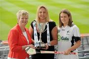 2 June 2010; At the launch of the Gala All-Ireland Camogie Championships 2010, from left, Joan O'Flynn, President, Cumann Camogaiochta na nGael, Denise Lord, Customer Service Manager, Gala, and Niamh Breen, Kildare, with the Junior A Cup. Camogie fans are set for a triple delight following the announcement at the launch that the Intermediate Camogie Final will be played with the Senior and Premier Junior Finals for the first time in GAA headquarters this year. Croke Park, Dublin. Picture credit: Brendan Moran / SPORTSFILE
