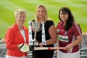 2 June 2010; At the launch of the Gala All-Ireland Camogie Championships 2010, from left, Joan O'Flynn, President, Cumann Camogaiochta na nGael, Denise Lord, Customer Service Manager, Gala, and Sandra Greville, Westmeath, with the Junior A Cup. Camogie fans are set for a triple delight following the announcement at the launch that the Intermediate Camogie Final will be played with the Senior and Premier Junior Finals for the first time in GAA headquarters this year. Croke Park, Dublin. Picture credit: Brendan Moran / SPORTSFILE
