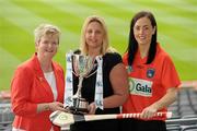 2 June 2010; At the launch of the Gala All-Ireland Camogie Championships 2010, from left, Joan O'Flynn, President, Cumann Camogaiochta na nGael, Denise Lord, Customer Service Manager, Gala, and Bernie Murray, Armagh, with the Junior A Cup. Camogie fans are set for a triple delight following the announcement at the launch that the Intermediate Camogie Final will be played with the Senior and Premier Junior Finals for the first time in GAA headquarters this year. Croke Park, Dublin. Picture credit: Brendan Moran / SPORTSFILE