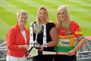 2 June 2010; At the launch of the Gala All-Ireland Camogie Championships 2010, from left, Joan O'Flynn, President, Cumann Camogaiochta na nGael, Denise Lord, Customer Service Manager, Gala, and Tara Wilson, Carlow, with the Junior A Cup. Camogie fans are set for a triple delight following the announcement at the launch that the Intermediate Camogie Final will be played with the Senior and Premier Junior Finals for the first time in GAA headquarters this year. Croke Park, Dublin. Picture credit: Brendan Moran / SPORTSFILE