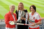 2 June 2010; At the launch of the Gala All-Ireland Camogie Championships 2010, from left, Joan O'Flynn, President, Cumann Camogaiochta na nGael, Denise Lord, Customer Service Manager, Gala, and Claire O'Kane, Derry, with the Intermediate Cup. Camogie fans are set for a triple delight following the announcement at the launch that the Intermediate Camogie Final will be played with the Senior and Premier Junior Finals for the first time in GAA headquarters this year. Croke Park, Dublin. Picture credit: Brendan Moran / SPORTSFILE