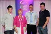 2 June 2010; Tipperary footballer Peter Acheson, second from right, who was short listed for the 2010 Cadbury Hero of the Future Award, with, from left, Robert Kearney, Eileen Acheson and Charlie Purcell. Peter was one of 14 short listed players who excelled throughout the 2010 Cadbury GAA U21 Football Championship. The 2010 Cadbury Hero of the Future Award was won by Rory O’Carroll, from Dublin. All nominees can be seen on www.cadburygaau21.com. Past winners, Colm O’Neill and Fintan Goold from Cork, Killian Young from Kerry and Keith Higgins from Mayo have gone on to represent their Counties at Senior level. Cadbury Under 21 Hero of the Future Awards, Croke Park, Dublin. Picture credit: Stephen McCarthy / SPORTSFILE