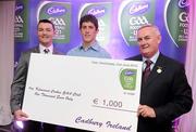 2 June 2010; Uachtarán Chumann Lúthchleas Gael Criostóir Ó Cuana and Shane Guest, Senior Brand Manager, Cadbury Ireland, presenting Dublin footballer Rory O'Carroll, 2010 Cadbury Hero of the Future Award Winner, with a €1,000 cheque for his club, Kilmacud Crokes, as part of his prize. Rory was one of 14 shortlisted players who had excelled throughout the 2010 Cadbury GAA U21 Football Championship, all nominees can be seen on www.cadburygaau21.com Past winners include Colm O’Neill and Fintan Goold from Cork, Killian Young from Kerry and Keith Higgins from Mayo and all have gone on to represent their counties at senior level. Rory, who plays his club football with Kilmacud Crokes, was named as a Cadbury Hero of the Match for his performance against Donegal in the All Ireland Final. The judging panel which consisted of senior Kildare footballer Dermot Earley, former Dublin manager Paul Caffrey and TG4 journalist Michael O’Domhnaill, gave serious consideration to the public vote which saw over 5,000 votes cast on cadburygaau21.com, but ultimately Rory O’Carroll’s heroic performances in both the semi-final against Roscommon and the final against Donegal, where he faced two of the Ireland’s most talented footballers meant he edged the competition out in the end. Cadbury Under 21 Hero of the Future Awards, Croke Park, Dublin. Picture credit: Stephen McCarthy / SPORTSFILE