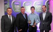 2 June 2010; Cadbury Hero of the Future Award judges, from left, TG4 journalist Michael O’Domhnaill, former Dublin manager Paul Caffrey and senior Kildare footballer Dermot Earley, right, with Dublin footballer Rory O'Carroll, the 2010 Cadbury Hero of the Future Award winner. Rory was one of 14 shortlisted players who had excelled throughout the 2010 Cadbury GAA U21 Football Championship, all nominees can be seen on www.cadburygaau21.com Past winners include Colm O’Neill and Fintan Goold from Cork, Killian Young from Kerry and Keith Higgins from Mayo and all have gone on to represent their counties at senior level. Rory, who plays his club football with Kilmacud Crokes, was named as a Cadbury Hero of the Match for his performance against Donegal in the All Ireland Final. The judging panel which consisted of senior Kildare footballer Dermot Earley, former Dublin manager Paul Caffrey and TG4 journalist Michael O’Domhnaill, gave serious consideration to the public vote which saw over 5,000 votes cast on cadburygaau21.com, but ultimately Rory O’Carroll’s heroic performances in both the semi-final against Roscommon and the final against Donegal, where he faced two of the Ireland’s most talented footballers meant he edged the competition out in the end. Cadbury Under 21 Hero of the Future Awards, Croke Park, Dublin. Picture credit: Stephen McCarthy / SPORTSFILE