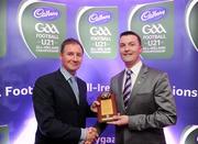 2 June 2010; Shane Guest, Senior Brand Manager, Cadbury Ireland, makes a presentation to Cadbury GAA U21 Football All-Ireland winning Dublin manager Jim Gavin. The 2010 Cadbury Hero of the Future Award was won by Rory O’Carroll, from Dublin. All nominees can be seen on www.cadburygaau21.com. Past winners, Colm O’Neill and Fintan Goold from Cork, Killian Young from Kerry and Keith Higgins from Mayo have gone on to represent their Counties at Senior level. Cadbury Under 21 Hero of the Future Awards, Croke Park, Dublin. Picture credit: Stephen McCarthy / SPORTSFILE