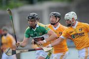 30 May 2010; Shane Dooley, Offaly, in action against Kieran McGourty and Aaron Graffin, right, Antrim. Leinster GAA Hurling Senior Championship, Antrim v Offaly, Parnell Park, Dublin. Picture credit: Brian Lawless / SPORTSFILE