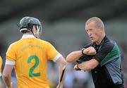 30 May 2010; Referee Anthony Stapleton speaks to Antrim's Kieran McGourty. Leinster GAA Hurling Senior Championship, Antrim v Offaly, Parnell Park, Dublin. Picture credit: Brian Lawless / SPORTSFILE