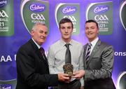 2 June 2010; Uachtarán Chumann Lúthchleas Gael Criostóir Ó Cuana and Shane Guest, Senior Brand Manager, Cadbury Ireland, with Donegal footballer Leo McLoone who was shortlisted for the 2010 Cadbury Hero of the Future Award. Leo was one of 14 short listed players who excelled throughout the 2010 Cadbury GAA U21 Football Championship. The 2010 Cadbury Hero of the Future Award was won by Rory O’Carroll, from Dublin. All nominees can be seen on www.cadburygaau21.com Past winners, Colm O’Neill and Fintan Goold from Cork, Killian Young from Kerry and Keith Higgins from Mayo have gone on to represent their Counties at Senior level. Cadbury Under 21 Hero of the Future Awards, Croke Park, Dublin. Picture credit: Stephen McCarthy / SPORTSFILE