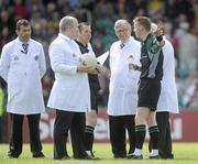 30 May 2010; Referee Joe McQuillan, and his team of officalls in discussion before the start of extra time. Ulster GAA Football Senior Championship Quarter-Final, Donegal v Down, Mac Cumhail Park, Ballybofey, Co. Donegal. Picture credit: Oliver McVeigh / SPORTSFILE