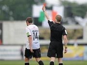 4 June 2010; Dundalk's JJ Melligan is shown a red card and sent off by referee Anthony Buttimer. FAI Ford Cup Third Round, Dundalk v St Patrick's Athletic, Oriel Park, Dundalk, Co. Louth. Photo by Sportsfile
