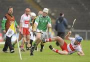 29 May 2010; Niall Forde, London, in action against Ruairi Convery, Derry. Ulster GAA Hurling Senior Championship Quarter-Final, Derry v London, Casement Park, Belfast. Picture credit: Oliver McVeigh / SPORTSFILE