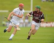 5 June 2010; Mark Moloney, Kildare, in action against Andrew Mitchell, Westmeath. Christy Ring Cup Semi-Final, Kildare v Westmeath, Pairc Tailteann, Navan, Co. Meath. Picture credit: Barry Cregg / SPORTSFILE