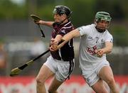 5 June 2010; Paudie Reidy, Kildare, in action against Kevin Brazil, Westmeath. Christy Ring Cup Semi-Final, Kildare v Westmeath, Pairc Tailteann, Navan, Co. Meath. Photo by Sportsfile