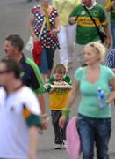 6 June 2010; Dean Horan, age 8, from Rathmore, Co. Kerry, enjoys his chips en-route to the game. Munster GAA Football Senior Championship Semi-Final, Kerry v Cork, Fitzgerald Stadium, Killarney, Co. Kerry. Picture credit: Stephen McCarthy / SPORTSFILE