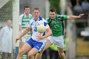 6 June 2010; Gary Hurney, Waterford, in action against Stephen Lucey, Limerick. Munster GAA Football Senior Championship Semi-Final, Waterford v Limerick, Fraher Field, Dungarvan, Co. Waterford. Picture credit: Brian Lawless / SPORTSFILE