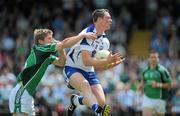 6 June 2010; Gary Hurney, Waterford, in action against Johnny McCarthy, Limerick. Munster GAA Football Senior Championship Semi-Final, Waterford v Limerick, Fraher Field, Dungarvan, Co. Waterford. Picture credit: Brian Lawless / SPORTSFILE